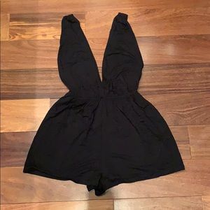 Black deep plunge romper